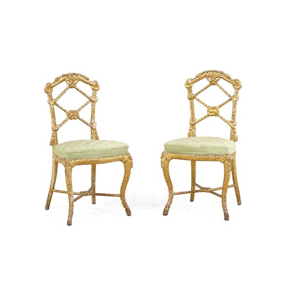 Coppia di sedie dorate. Francia, XIX secolo