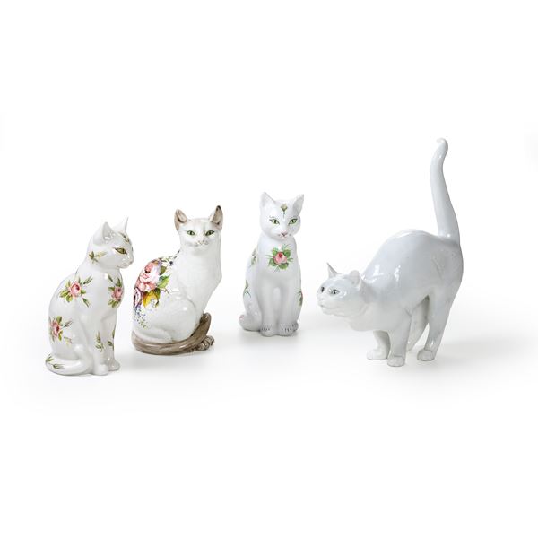 Quattro figurine di gatti. Italia, Basssano e Danimarca, Copenhagen, XX secolo.