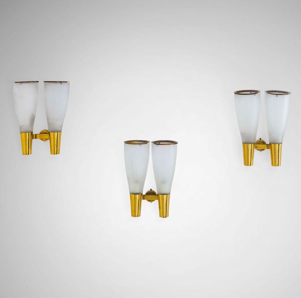 Tre lampade a parete