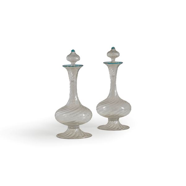 Coppia di bottiglie.<BR>Murano, XX secolo.