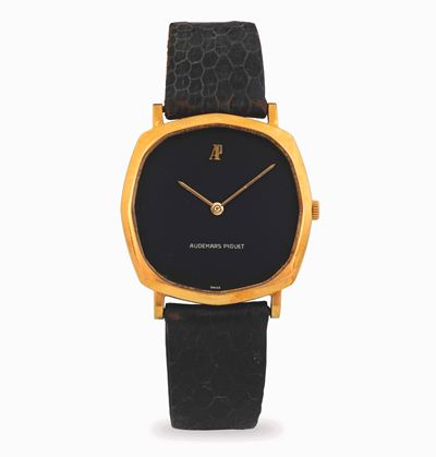 Dress watch ultra-piatto in oro giallo 18kt con quadrante nero, circa 1970
