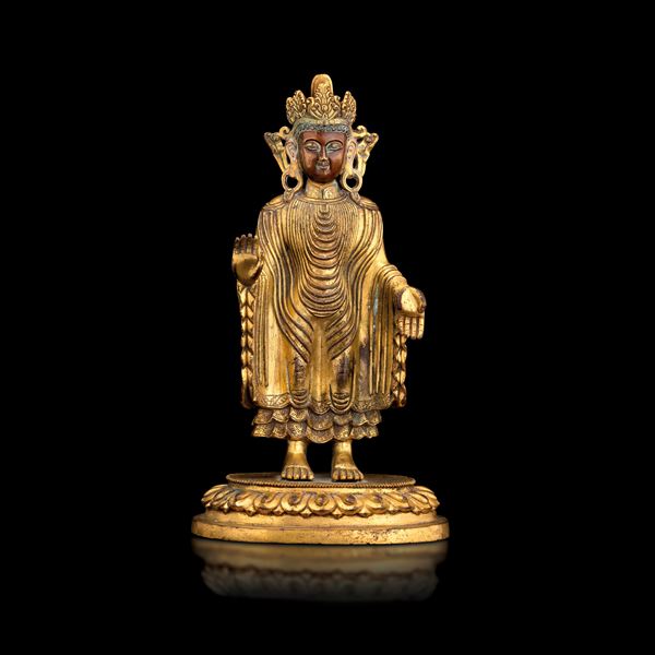 Figure of Buddha standing on a lotus flower in gilded bronze, China, Qing Dynasty, 18th century