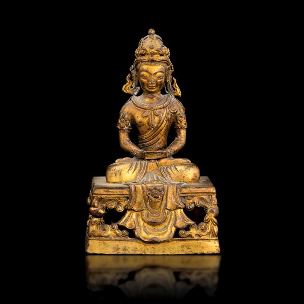 Gilded bronze figure of the crowned Buddha Amitayus with inscriptions, China, Qing Dynasty, marked and from the Qianlong period (1736-1796)