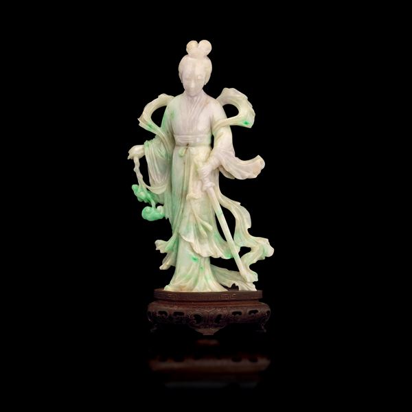 Figure of Warrior Guanyin carved in white jadeite with lavender and apple green tones, China, Qing Dynasty, 19th century.