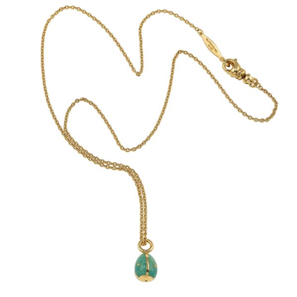 Enamel and gold egg pendant. Signed Fabergé