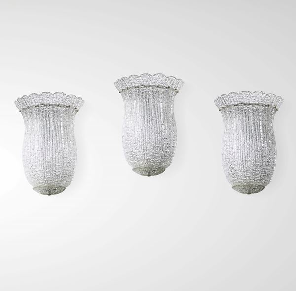 Tre lampade a parete