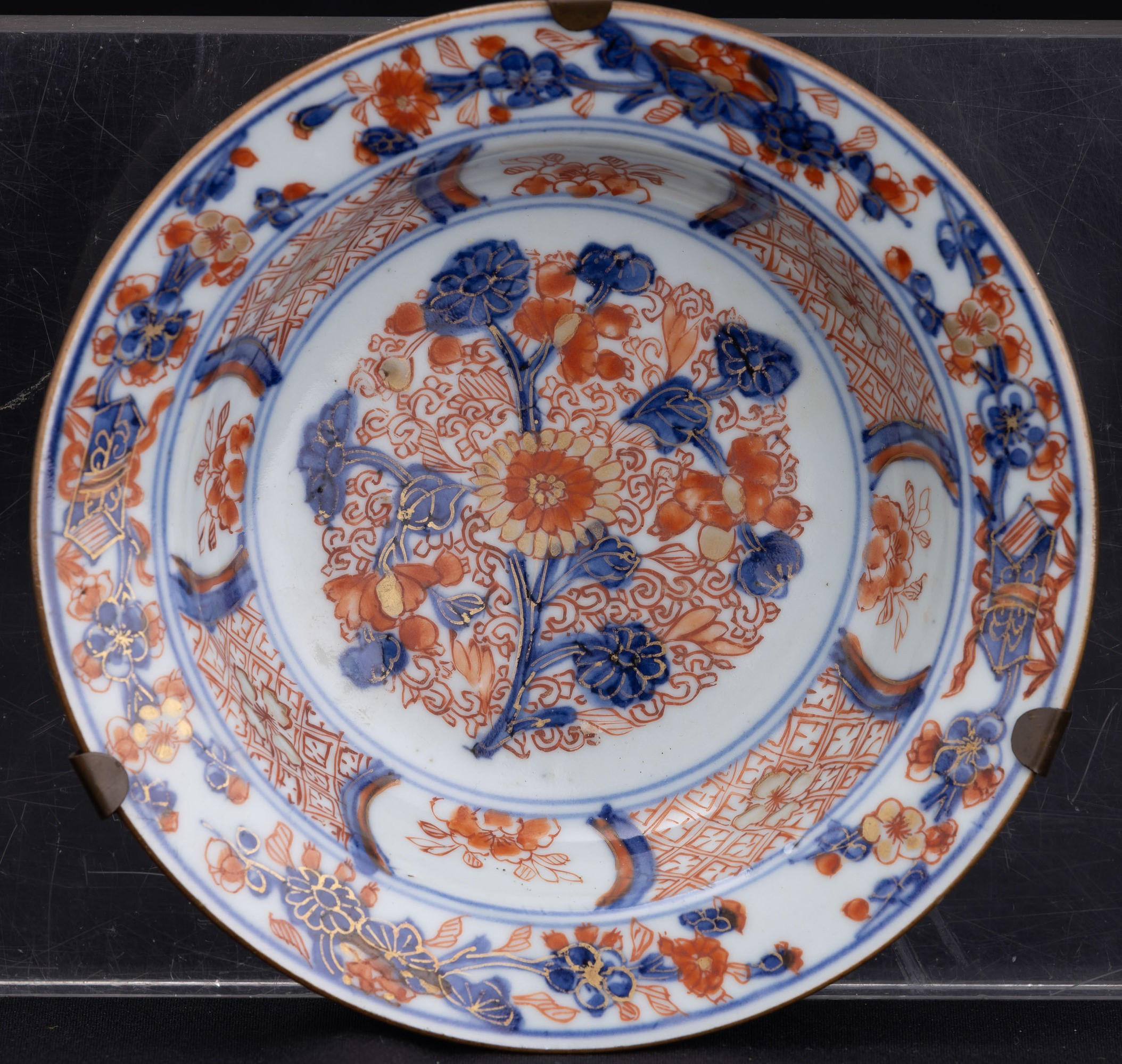 Quattro piatti in porcellana Imari, Arita, Giappone, XVIII secolo