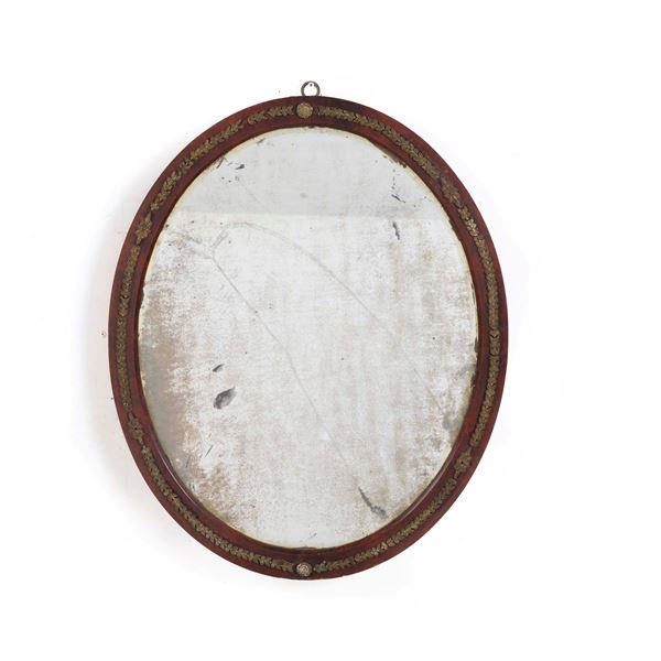 Specchiera Impero lastronata. XIX secolo