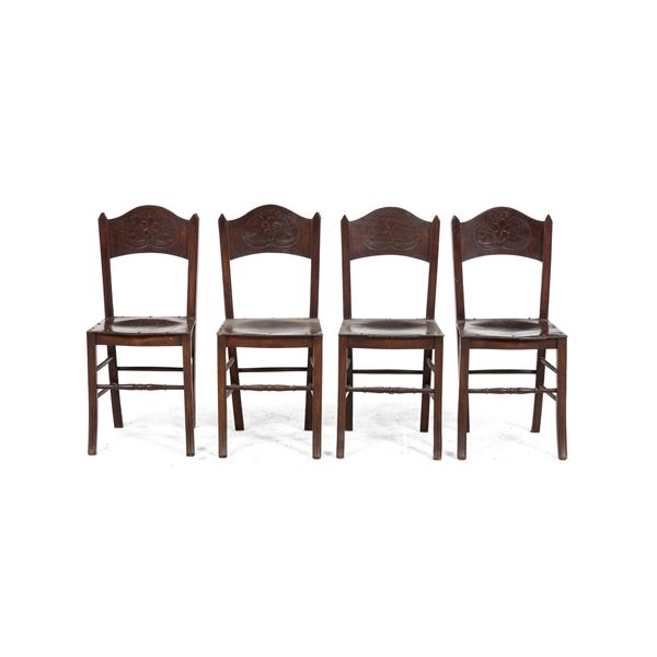 Quattro sedie in legno XX secolo