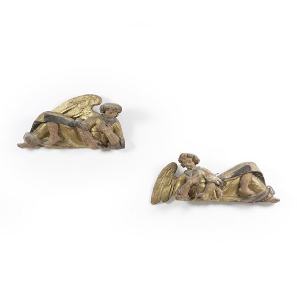 Coppia di angeli distesi. Arte barocca italiana del XVII secolo