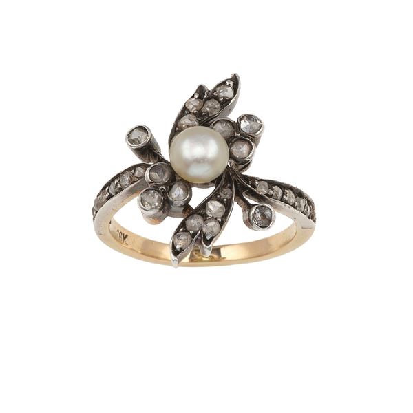 Natural, saltwater, pearl weighing ct 0.70 approximately, gold and silver ring. Gemmological Report IGN n. 36707