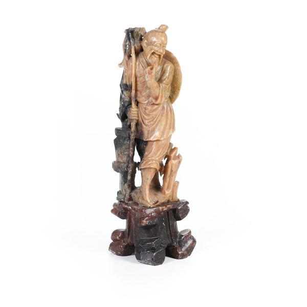 Figura di orientale in pietra dura. XX secolo