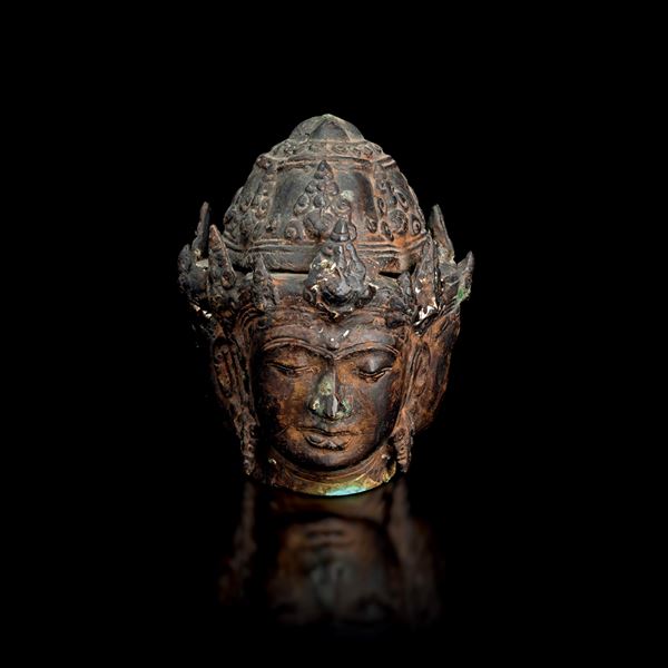 Bronze head of crowned Buddha Trimurti, India, 19th century