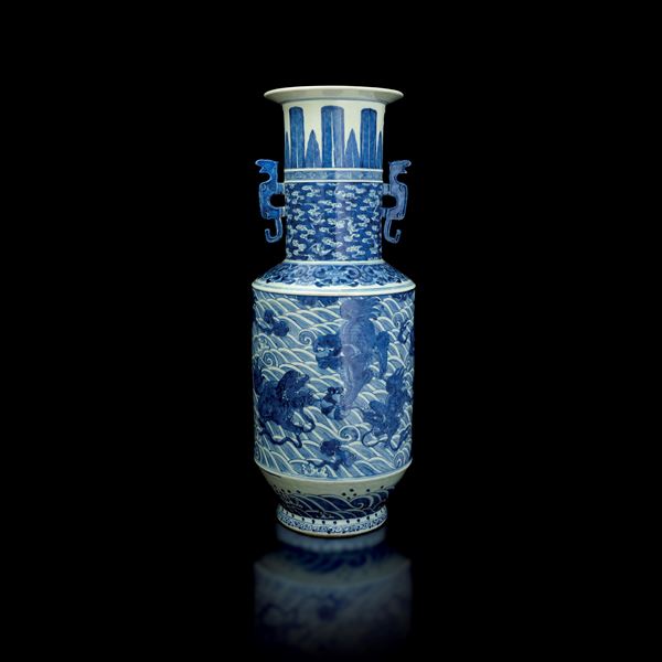 Blue and white porcelain vase depicting Foo Dogs and bats with a wave band, geometric motif decorations, and handles shaped as seahorses, China, Qing Dynasty, Daoguang period (1821–1850)