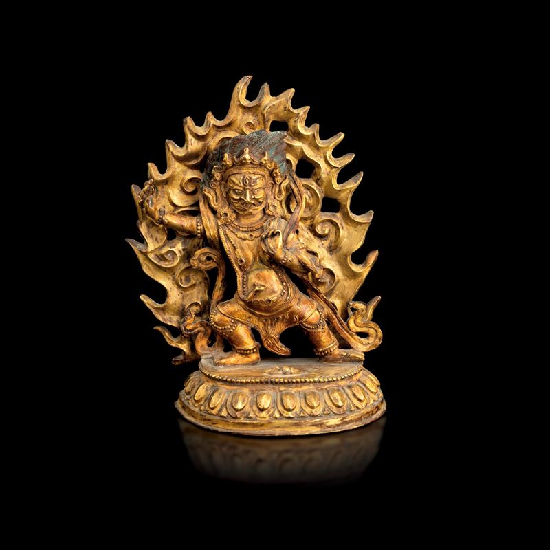 Figura in bronzo dorato raffigurante Mahakala su fiore di loto, Tibet, XIX secolo  - Asta Fine Asian Works of Art - Cambi Casa d'Aste