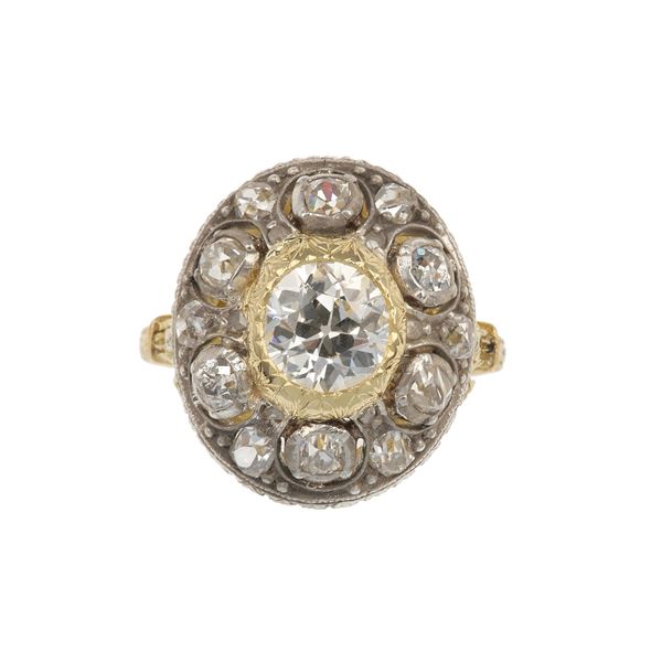 M. Buccellati. Anello con diamante di vecchio taglio di ct 1.20 circa e diamanti a contorno