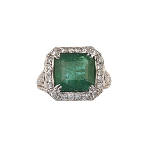 Anello con smeraldo Zambia di ct 6.09 circa e diamanti a contorno