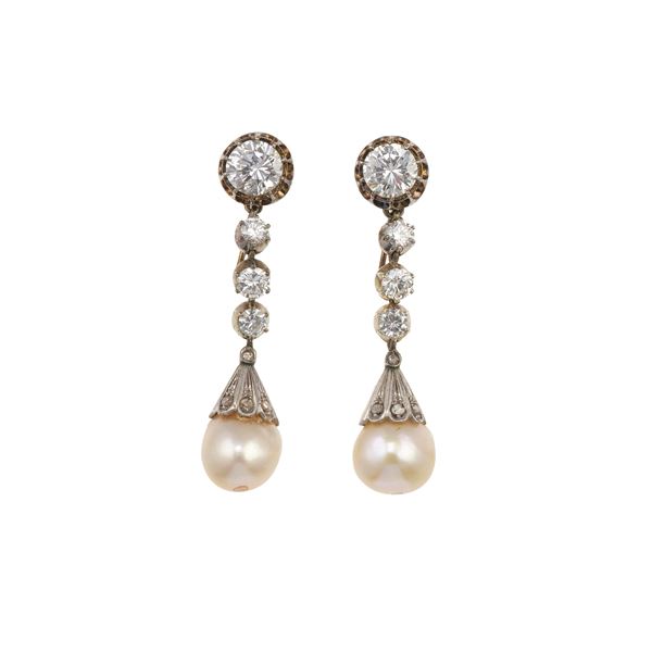 Pair of brilliant-cut diamond, cultured pearl and platinum earrings. The pendant can be removed