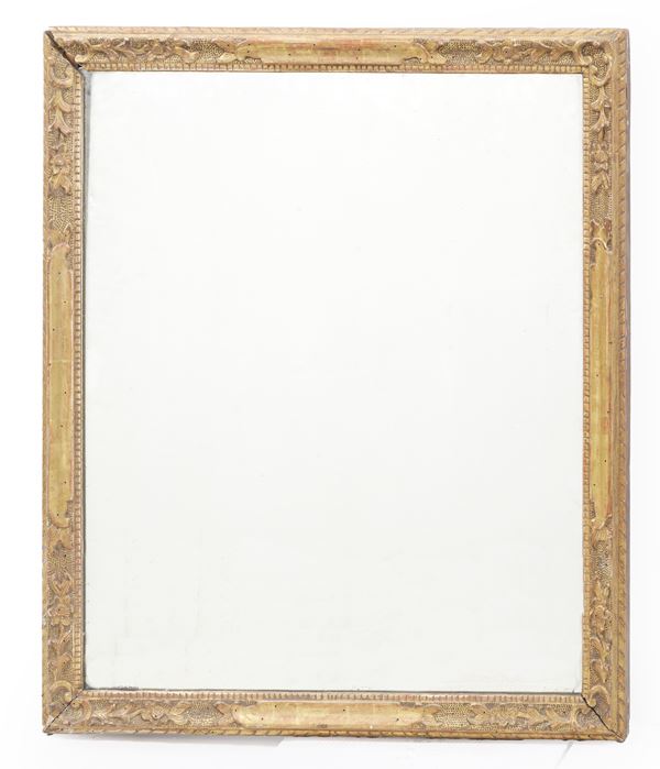 Cornice in legno intagliato e dorato. XIX-XX secolo