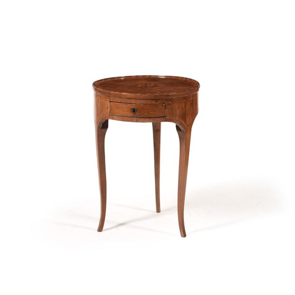 Tavolino tondo ad un cassetto. XIX secolo