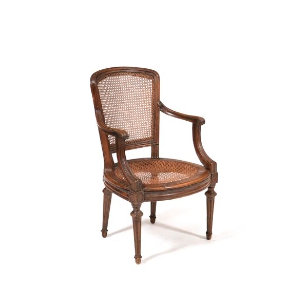 Poltrona Luigi XVI in legno e cannetè. Fine XVIII secolo