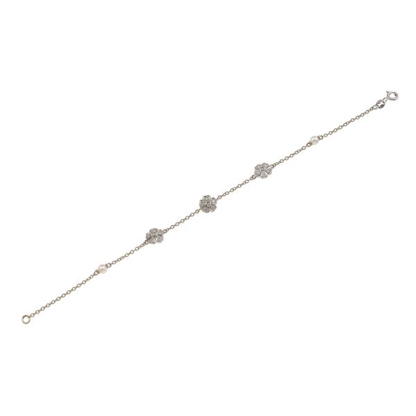 Bracciale "fiori" con piccole perle e diamanti