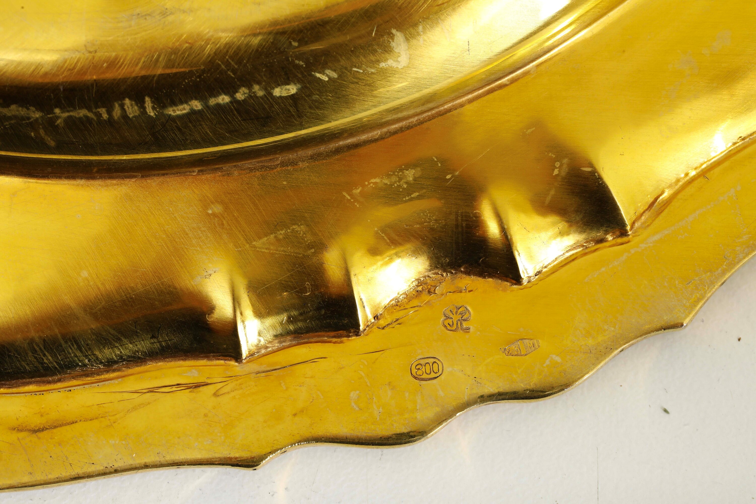 Genazzi per Chiappe, Argenteria milanese del XX secolo: ventiquattro piatti in argento fuso sagom...