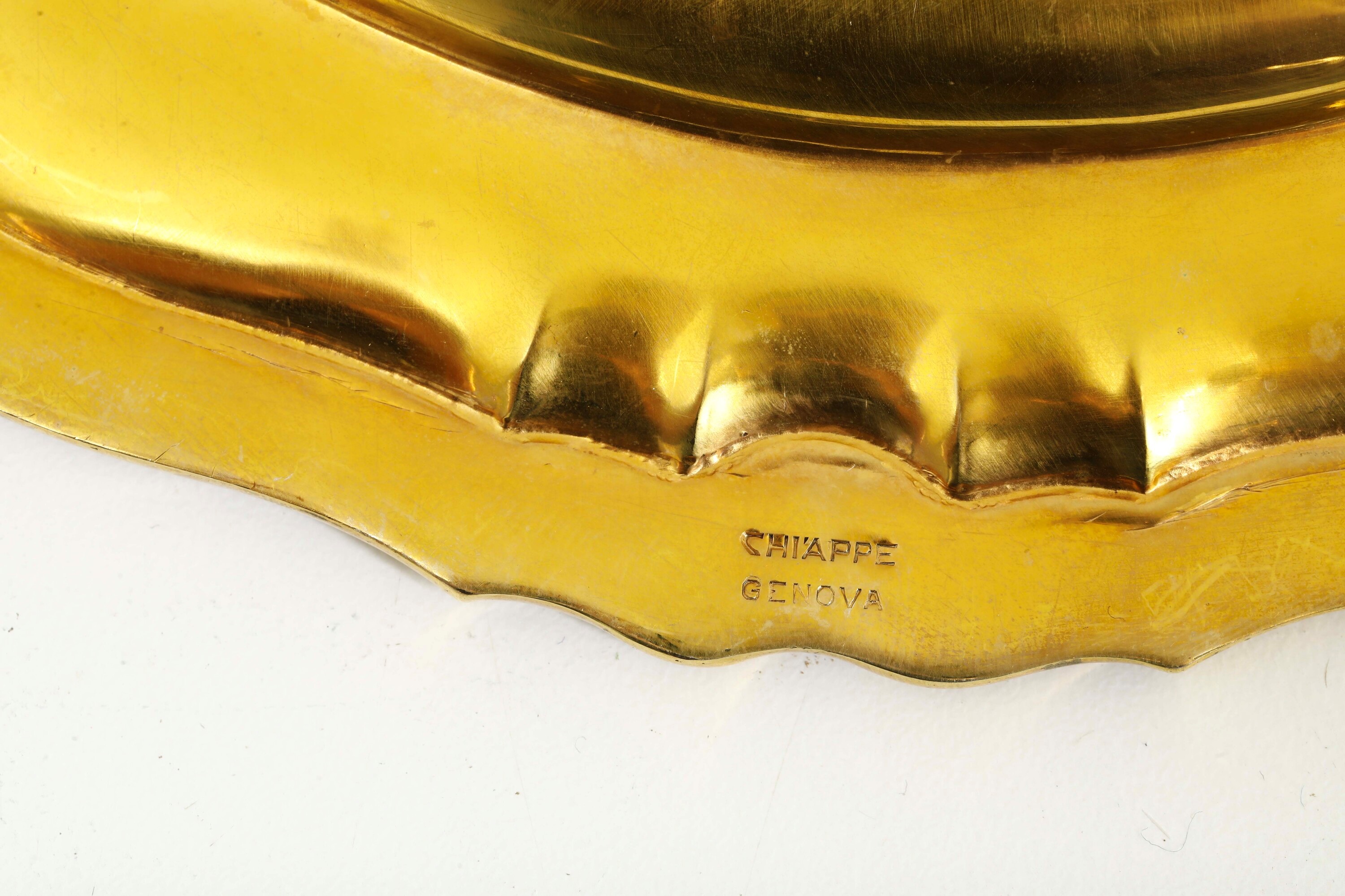 Genazzi per Chiappe, Argenteria milanese del XX secolo: ventiquattro piatti in argento fuso sagom...