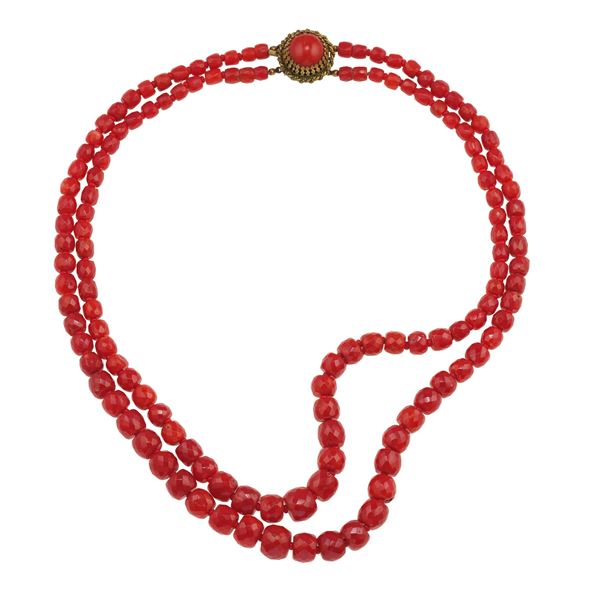 Two-row graduated coral bead necklace with a metal clasp