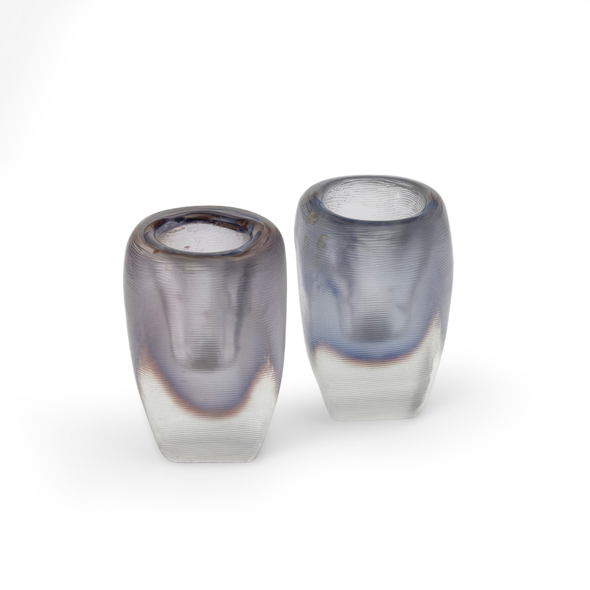 Venini, Coppia di portacandele in vetro sommerso policromo, Murano (circa 1950)