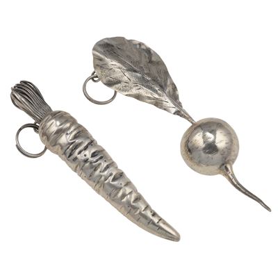 M. Buccellati, Due oggetti decorativi in argento a soggetto vegetale