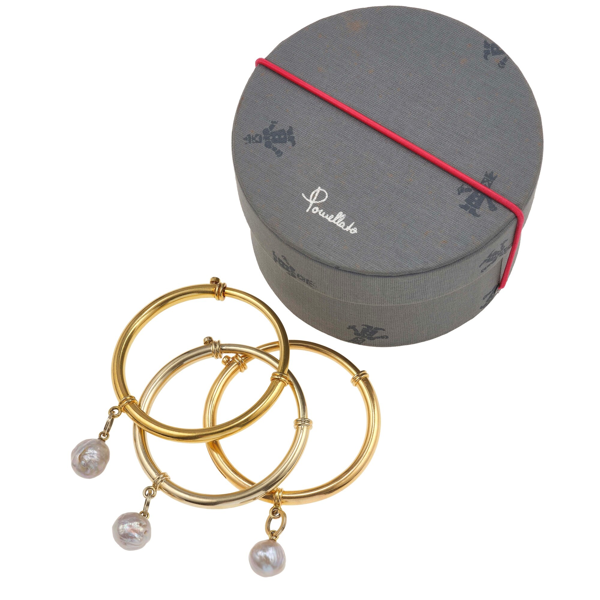 Pomellato, Tre bracciali rigidi con perle barocche in oro 18 carati