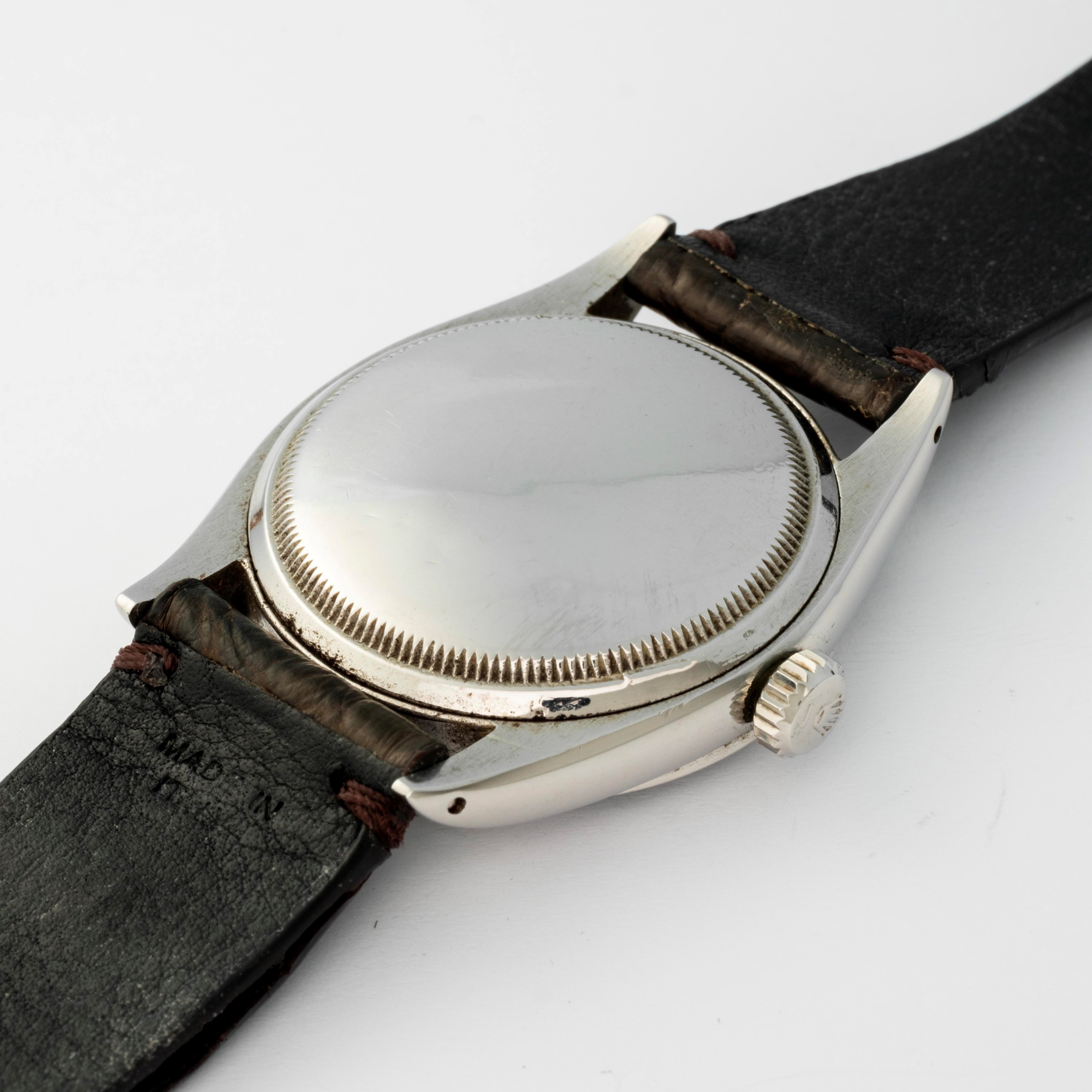 Rolex - Ovettone Explorer ref. 6298 in acciaio con quadrante nero e grafica argentata, circa 1953