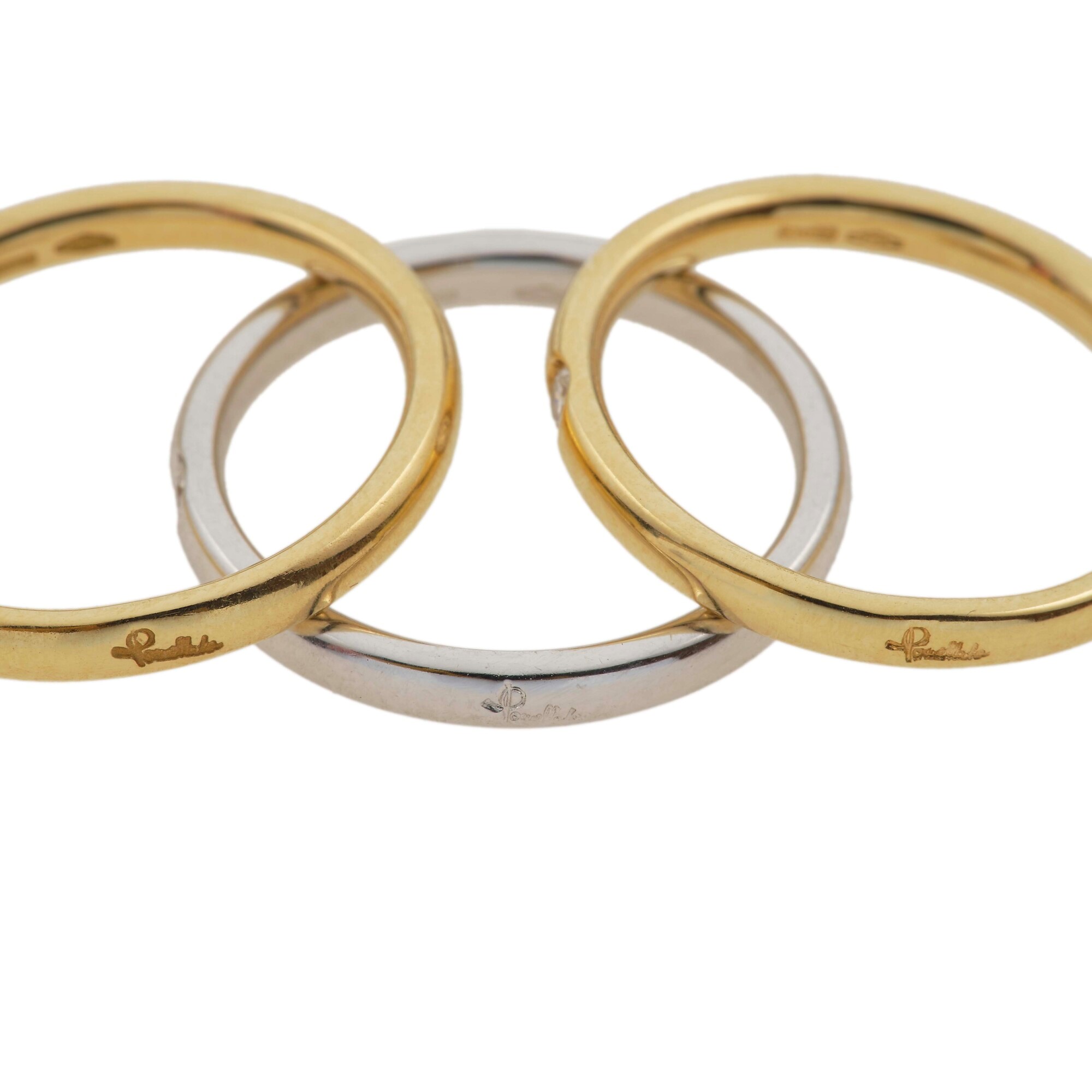 Pomellato, Tre anelli 'Lucciole' in oro giallo e bianco con diamanti