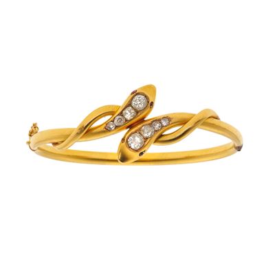 Bracciale rigido 'serpenti' in oro giallo 750 con diamanti di vecchio taglio