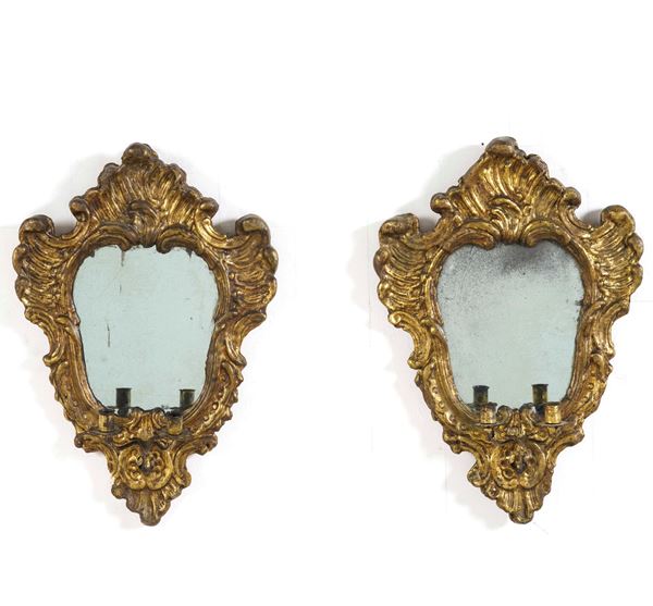 Coppia di ventoline in legno intagliato e dorato. XVIII-XIX secolo