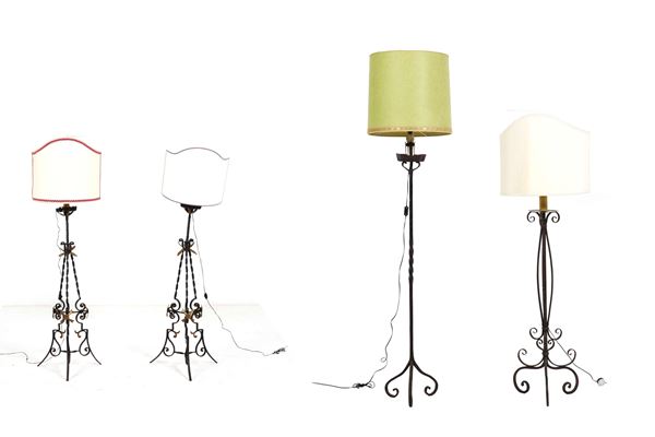 Quattro diverse piantane in ferro battuto