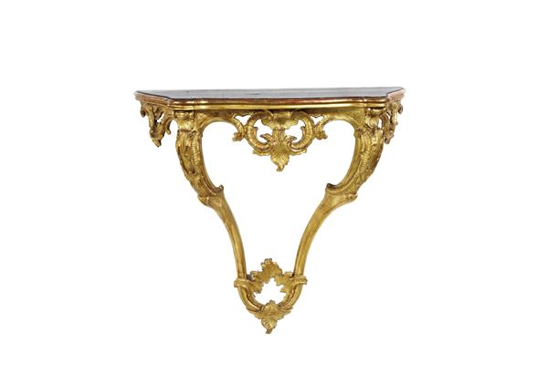 Consolle a goccia in legno intagliato e dorato. XVIII-XIX secolo