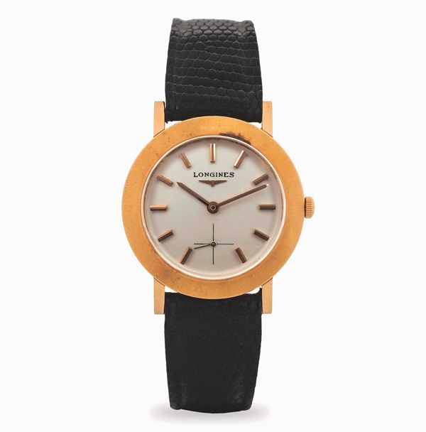 Longines - Disco Volante in yellow gold 18k, with applied indexes and small seconds at six, circa 1960