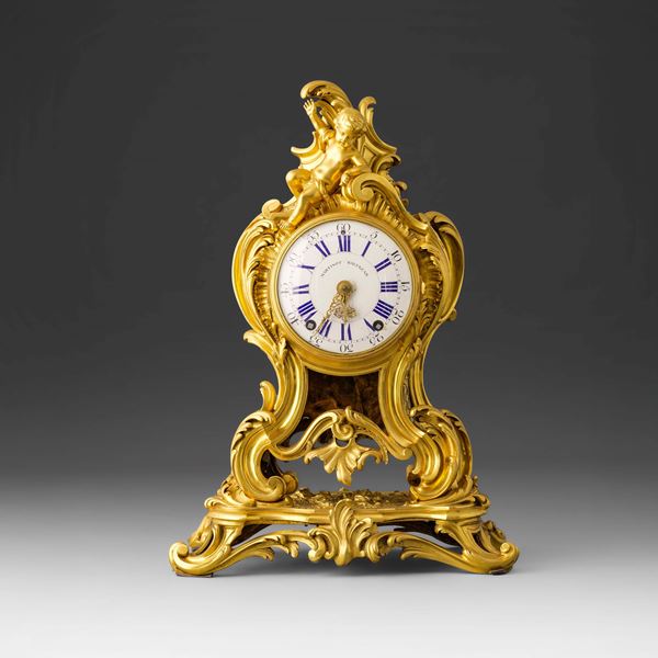 Pendola da tavolo in bronzo dorato. Balthazar Martinot, Parigi XVIII secolo 