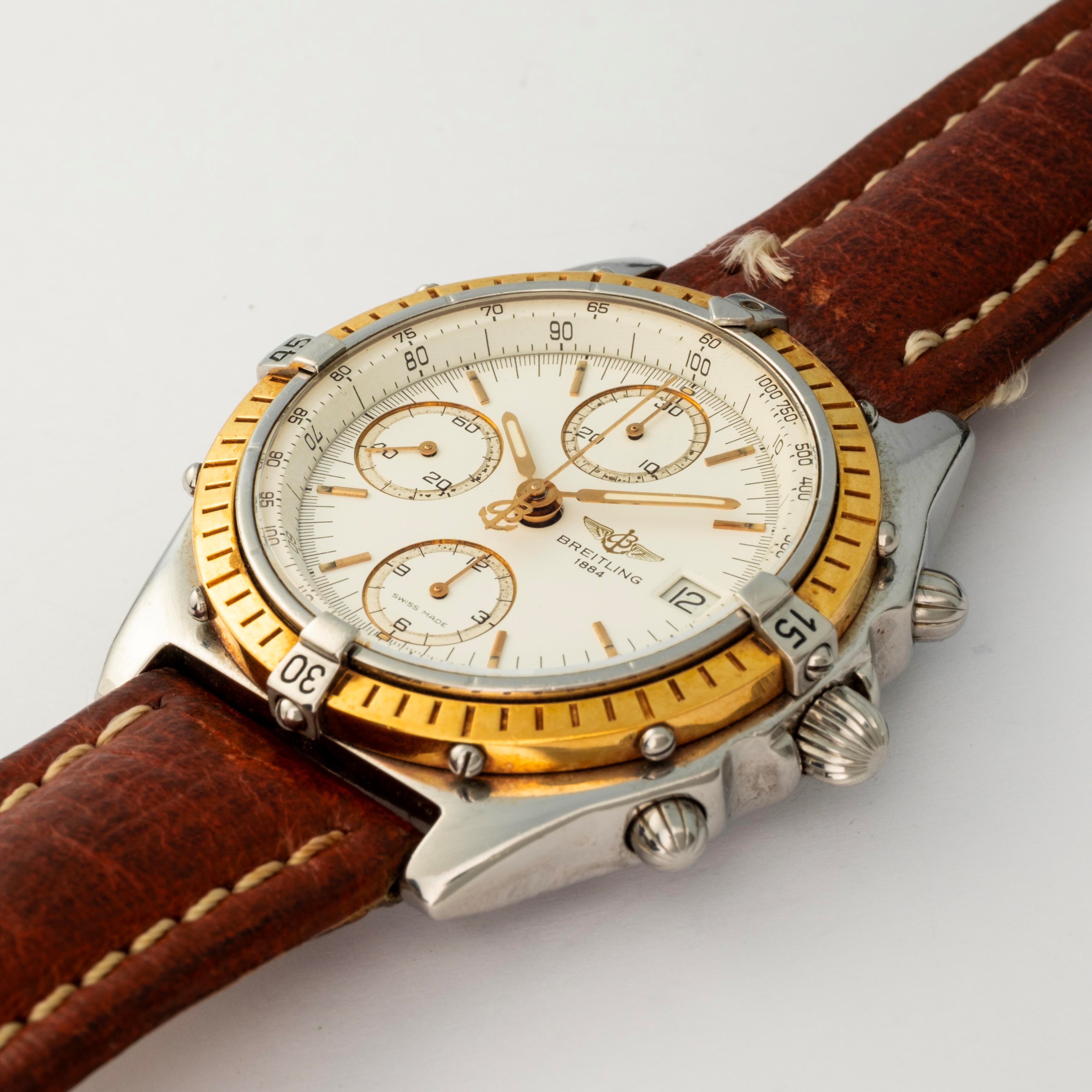 Breitling - Chronomat ref. 81950 in acciaio e oro con quadrante bianco a tre contatori, circa 199...