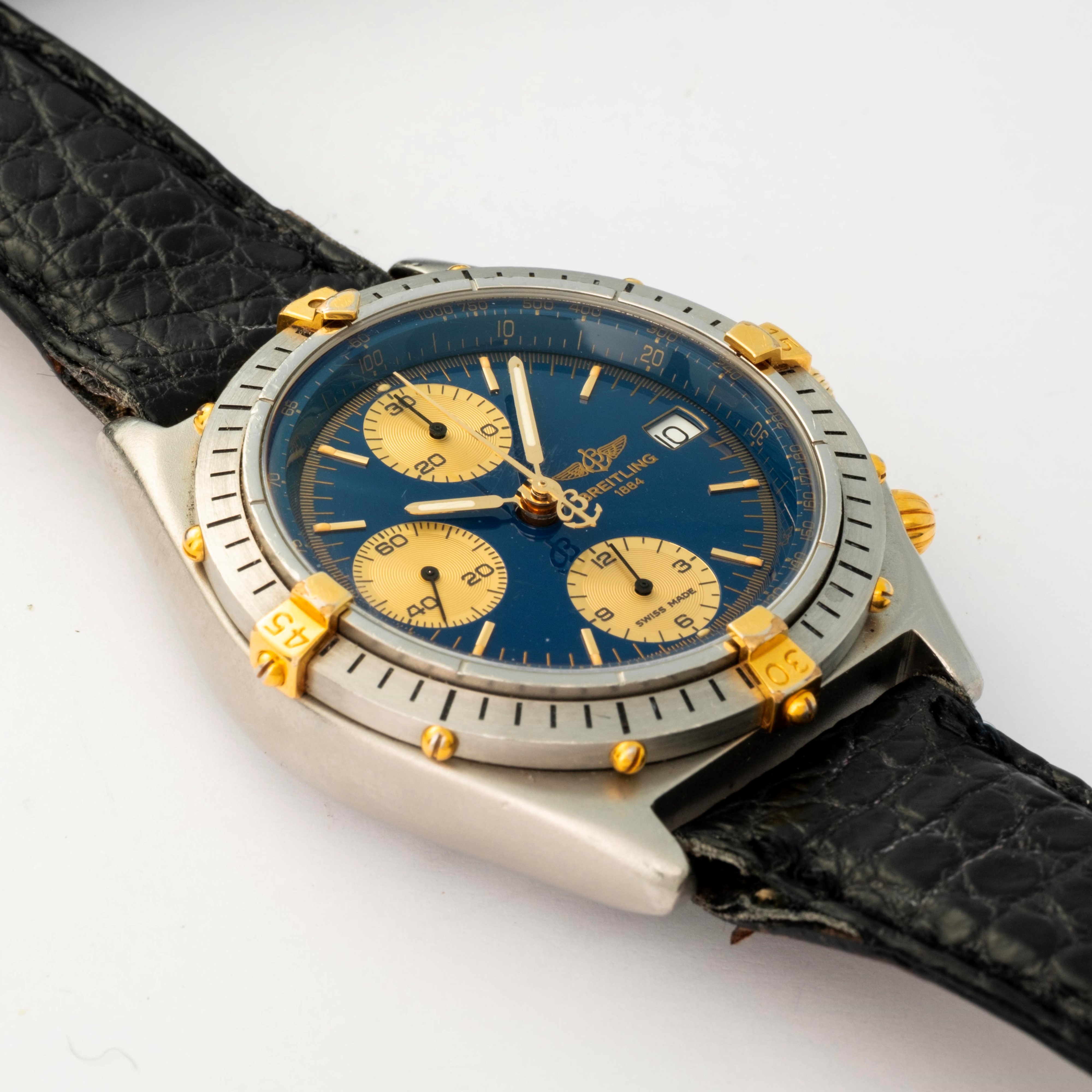 Breitling - Chronomat in acciaio e oro con quadrante blu e contatori champagne, circa 1990