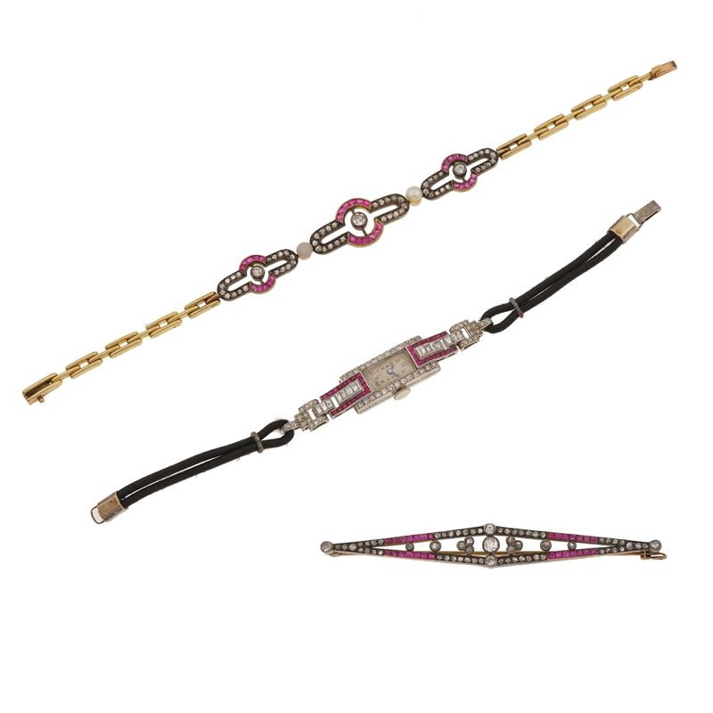 Group of diamond, ruby, synthetic ruby and cultured pearl, silver and gold jewels. Watch numbered 2835. The movement has not been tested for the accuracy of time and may need a service. Bracelet damaged  - Auction Fine Jewellery - Cambi Casa d'Aste