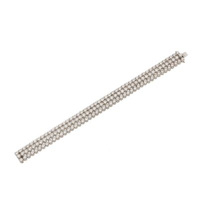 Bracciale a tre file di diamanti taglio brillante, oro bianco 750/1000, ct 12.20 circa