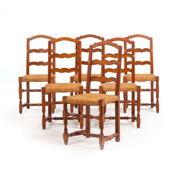 Gruppo di sei sedie a rocchetto in legno intagliato. XIX secolo