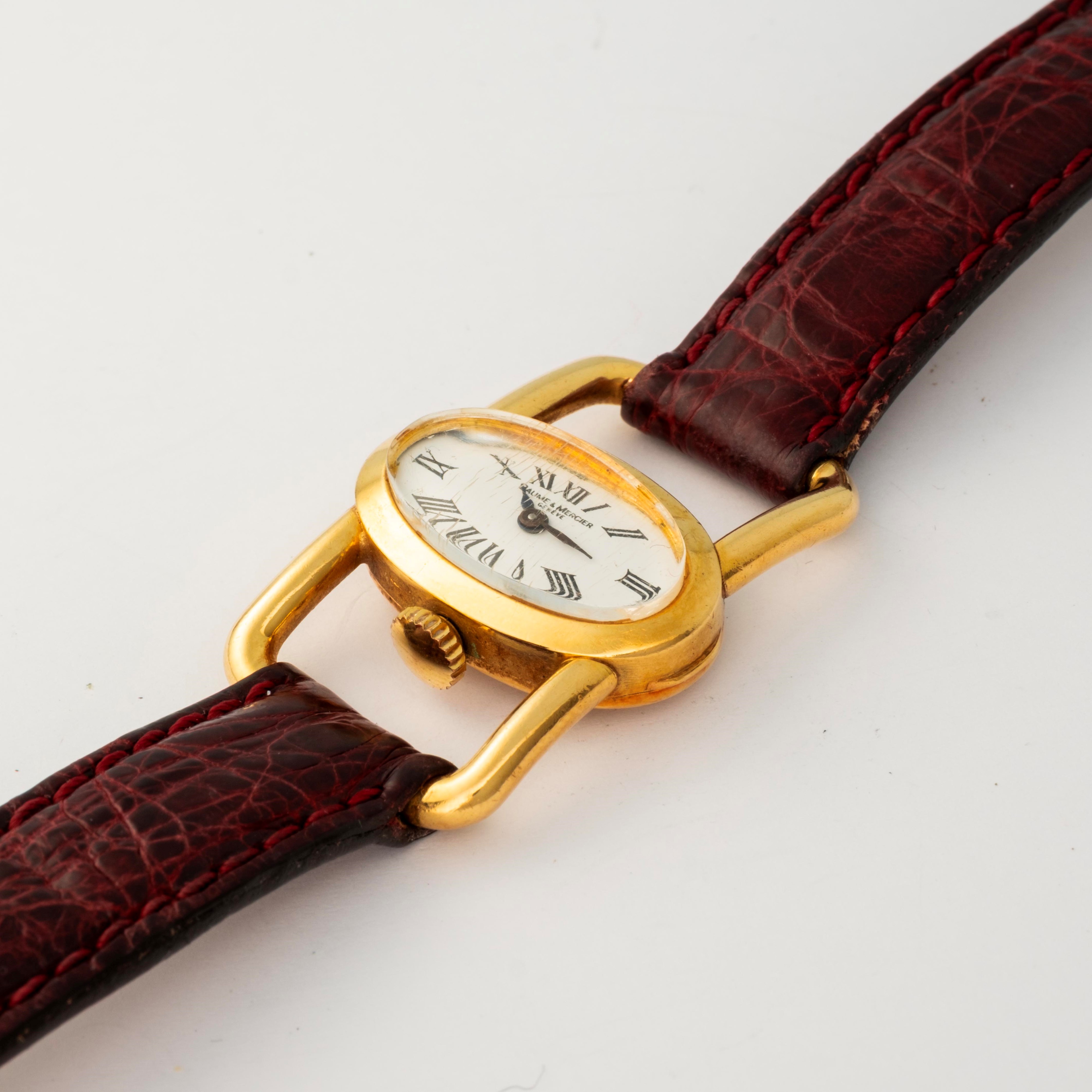 Baume & Mercier - Orologio Etrier in oro giallo 18k con quadrante bianco e numeri romani, circa 1...