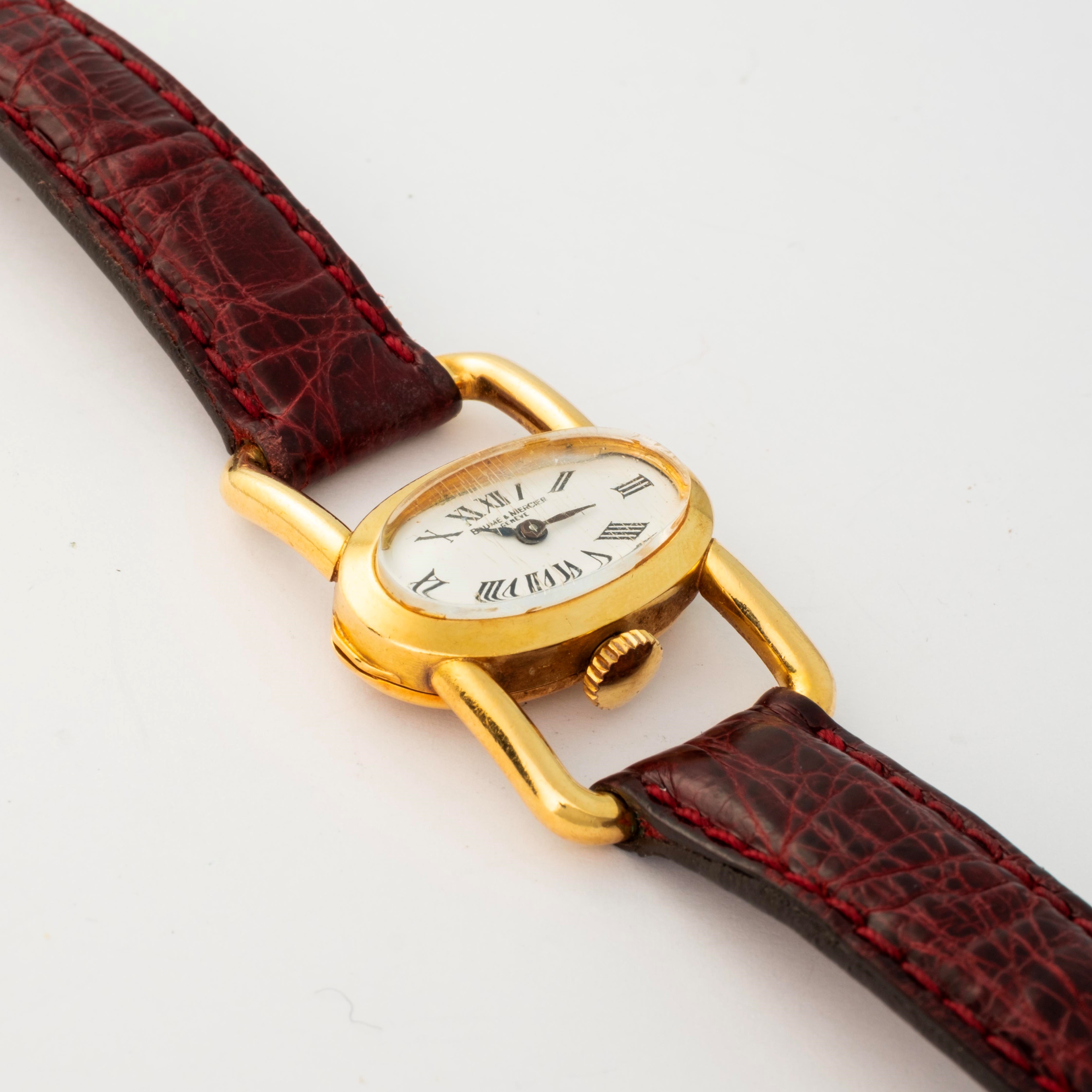 Baume & Mercier - Orologio Etrier in oro giallo 18k con quadrante bianco e numeri romani, circa 1...