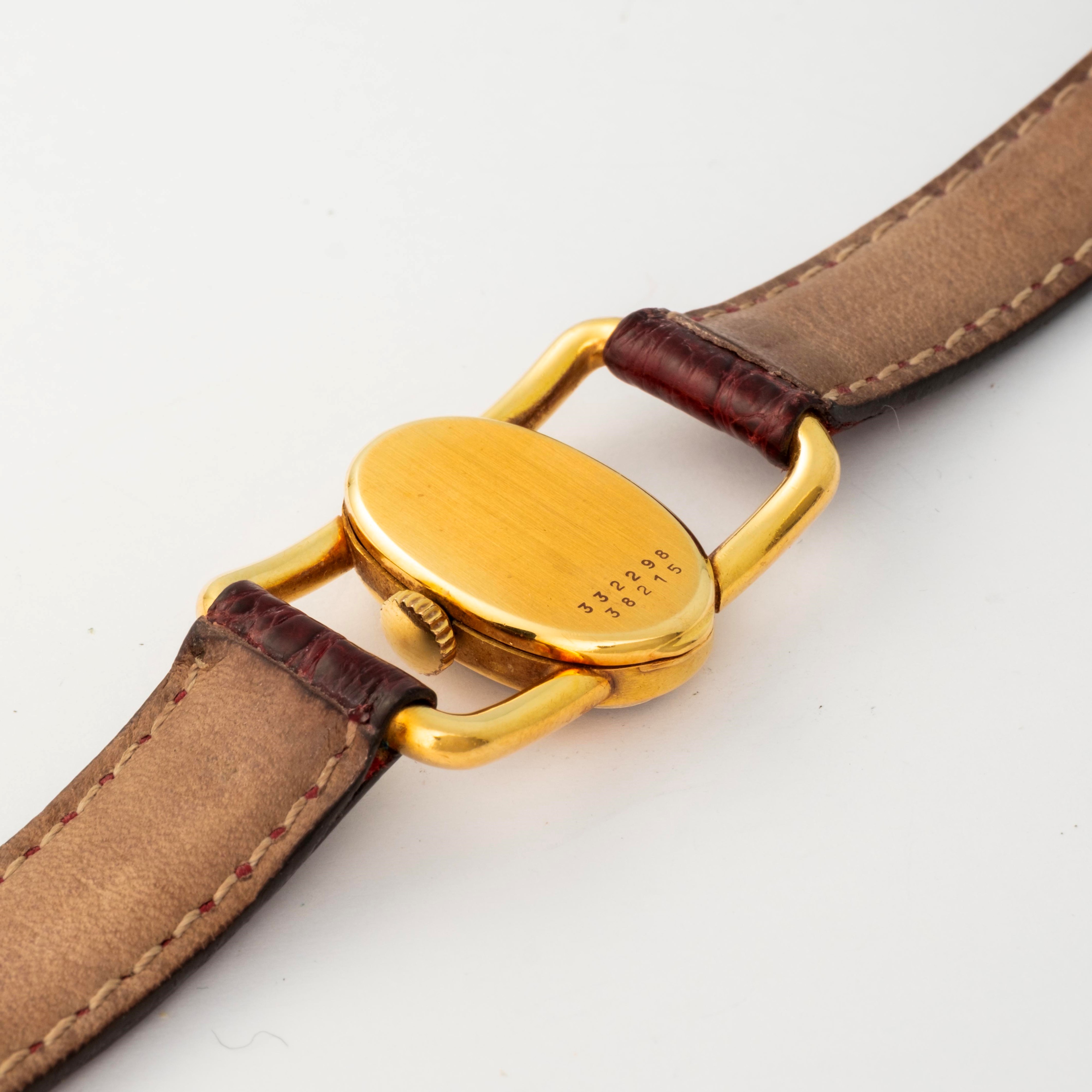 Baume & Mercier - Orologio Etrier in oro giallo 18k con quadrante bianco e numeri romani, circa 1...