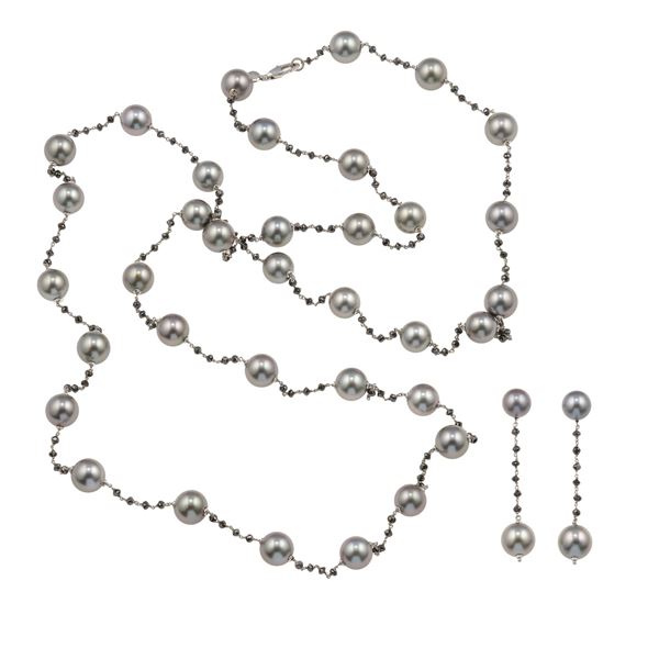 Grey pearl, diamond and gold demi-parure. Signed Cusi