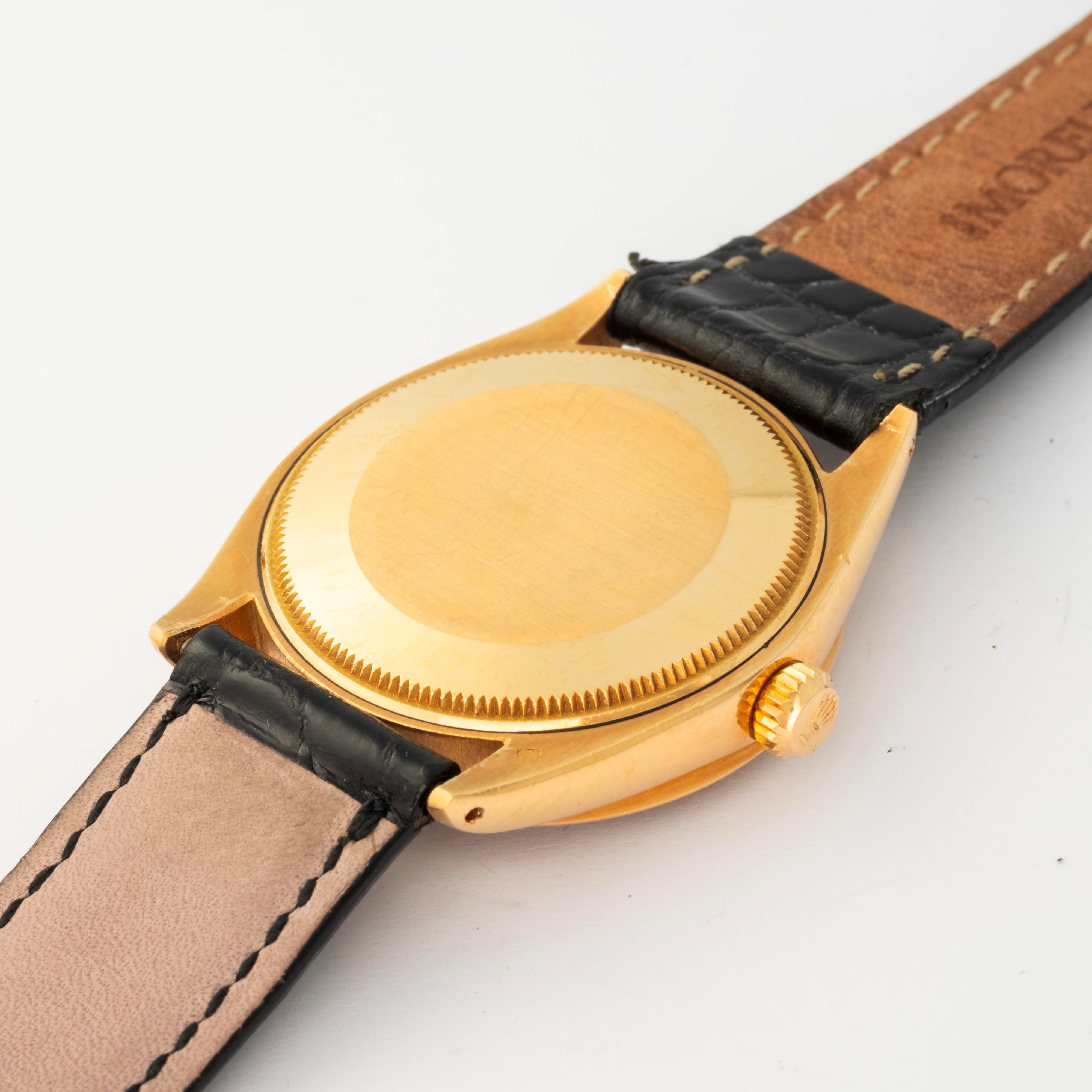 Rolex - Oyster Perpetual ref. 1007 in oro giallo 18k con quadrante nero, circa 1965